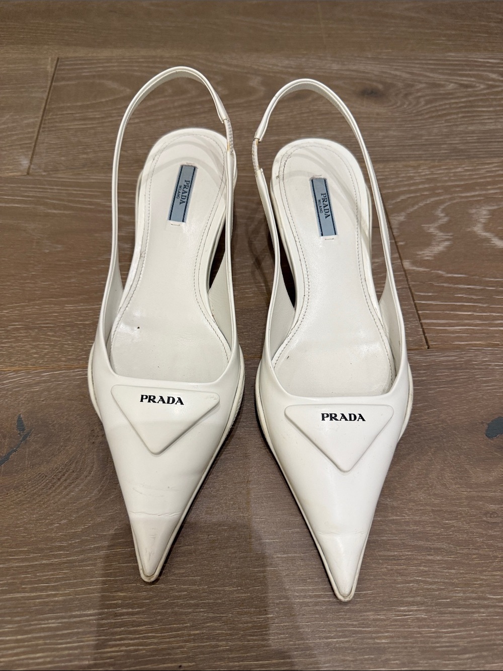 Prada White Pointed Toe Leather Slingback Pumps with Logo Plaque